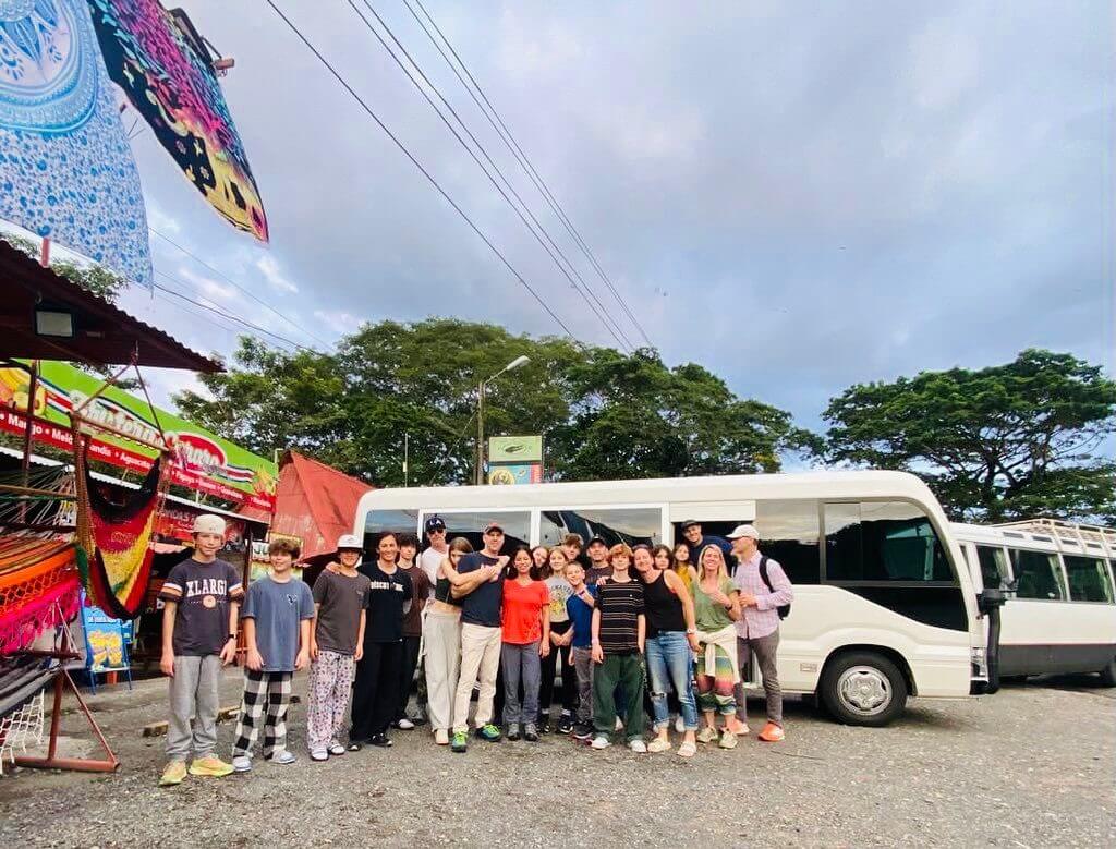 http://Group%20of%20travelers%20standing%20by%20a%20JTC%20Transfer%20van%20during%20a%20Private%20Costa%20Rica%20airport%20transportation%20service%20from%20SJO%20to%20Jaco